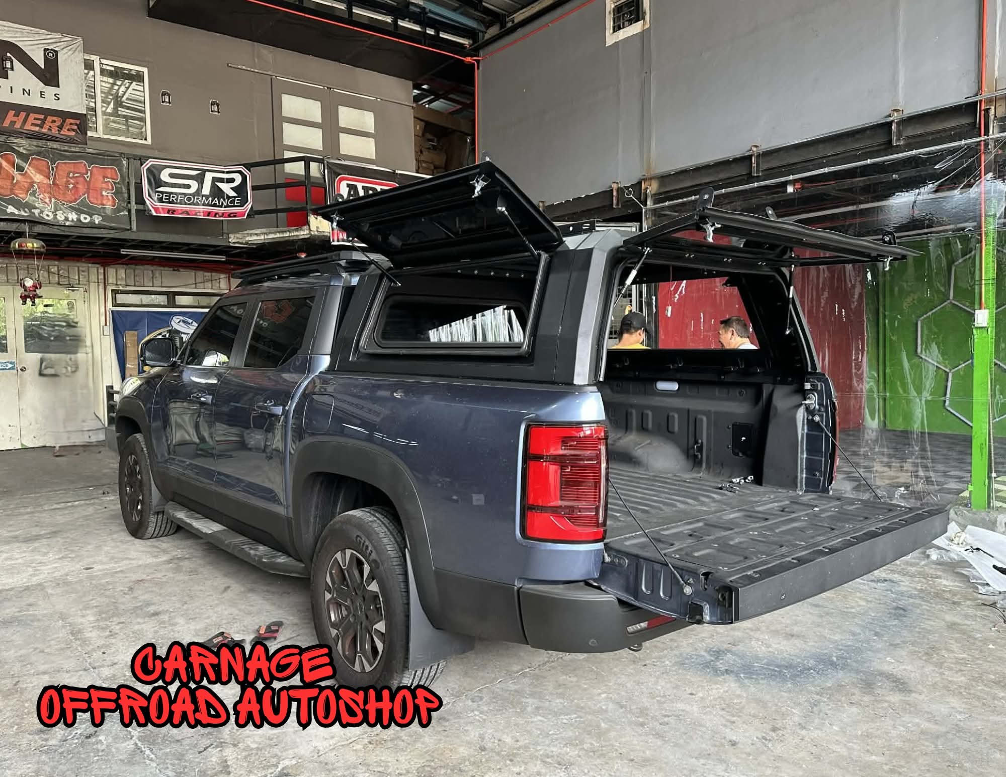Pickup with hard tonneau bedcover and canopy — finished install